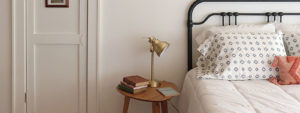 bedroom with lamp on desk
